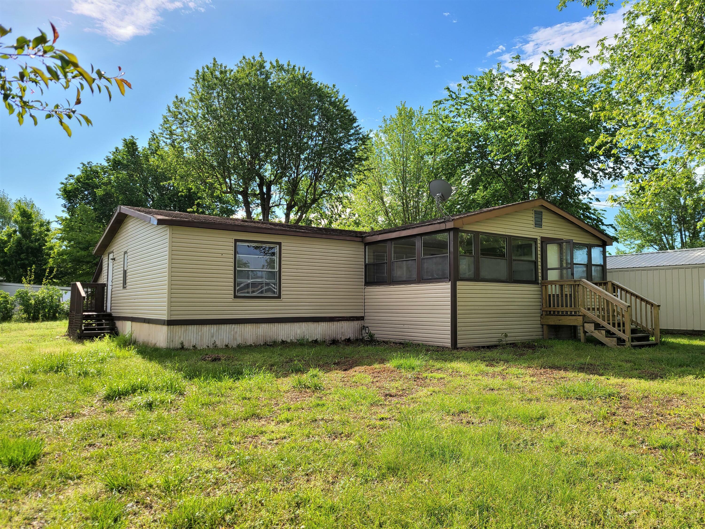 Property Photo:  707 S Roney Street  MO 64834 