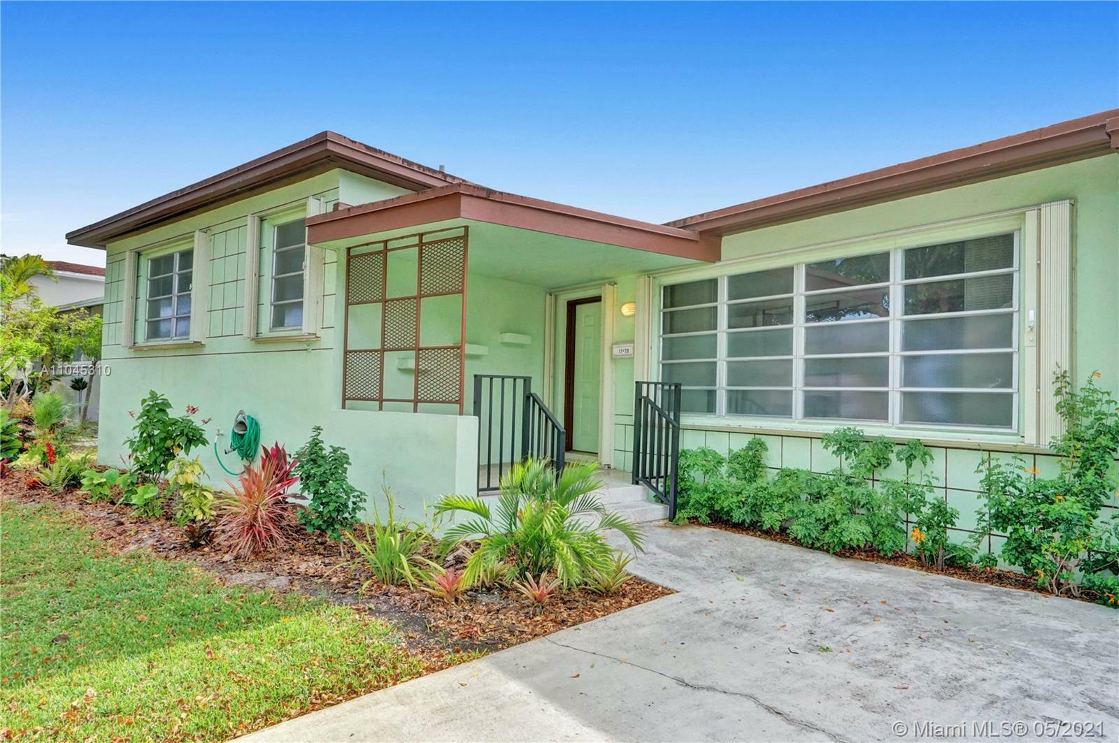 Property Photo:  12620 NE 1st Ave  FL 33161 