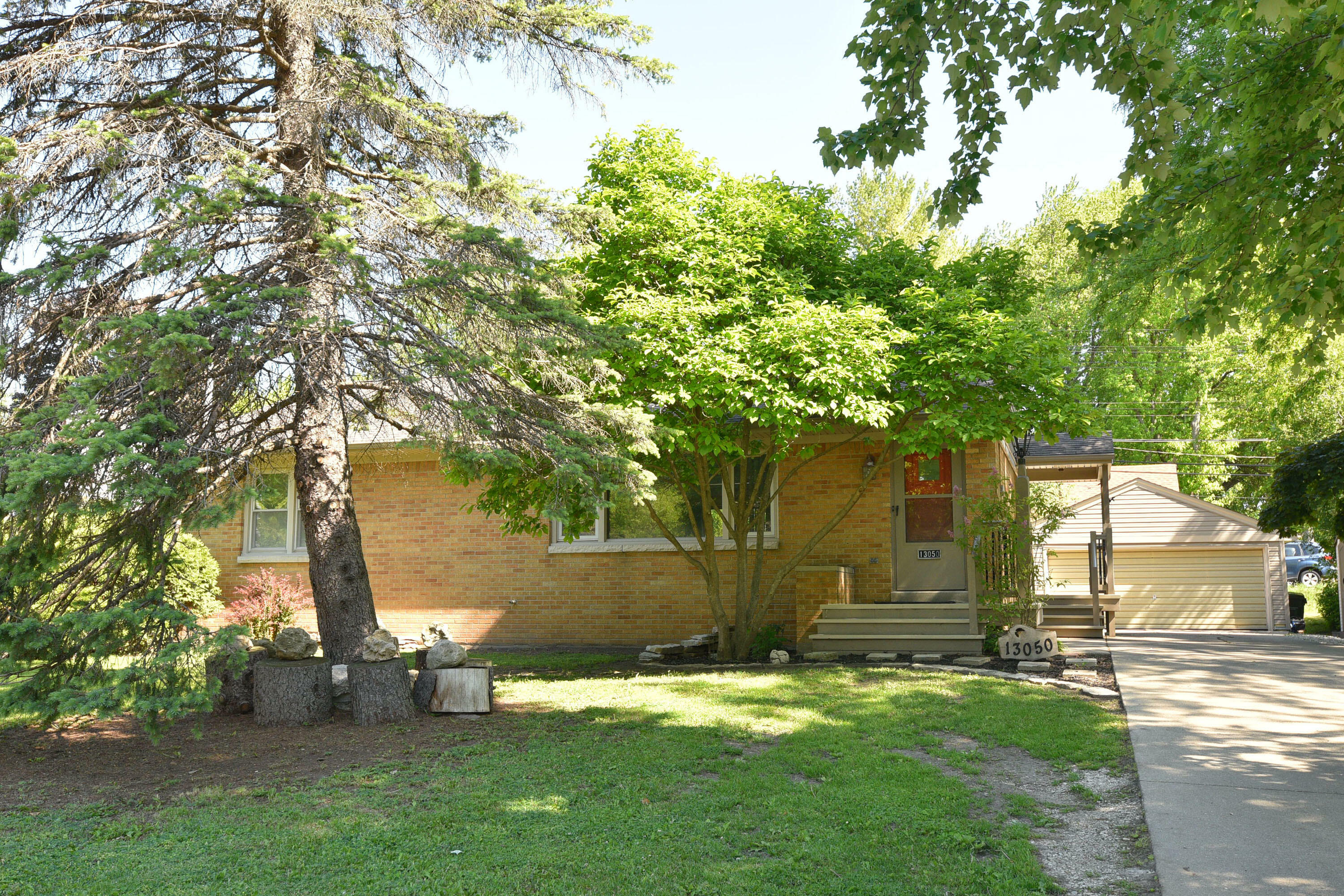 Property Photo:  13050 W Greenfield Ave  WI 53005 
