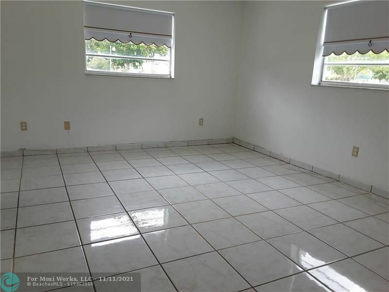 Property Photo:  4090 NW 42nd Ave 102  FL 33319 