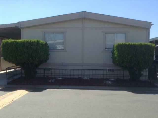 Property Photo:  812 W Clover Road 72  CA 95376 