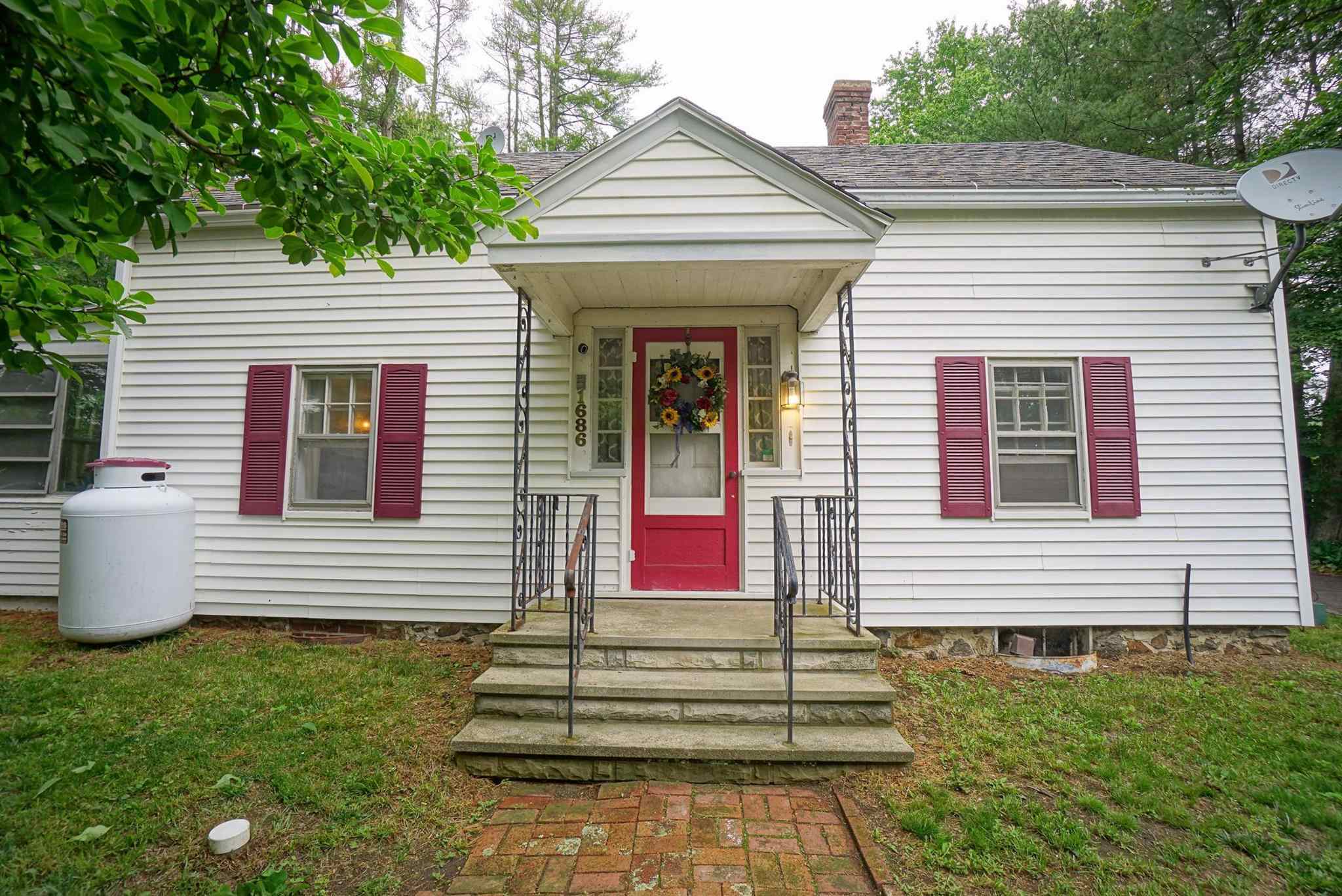 Property Photo:  1686 Dover Road  NH 03234 