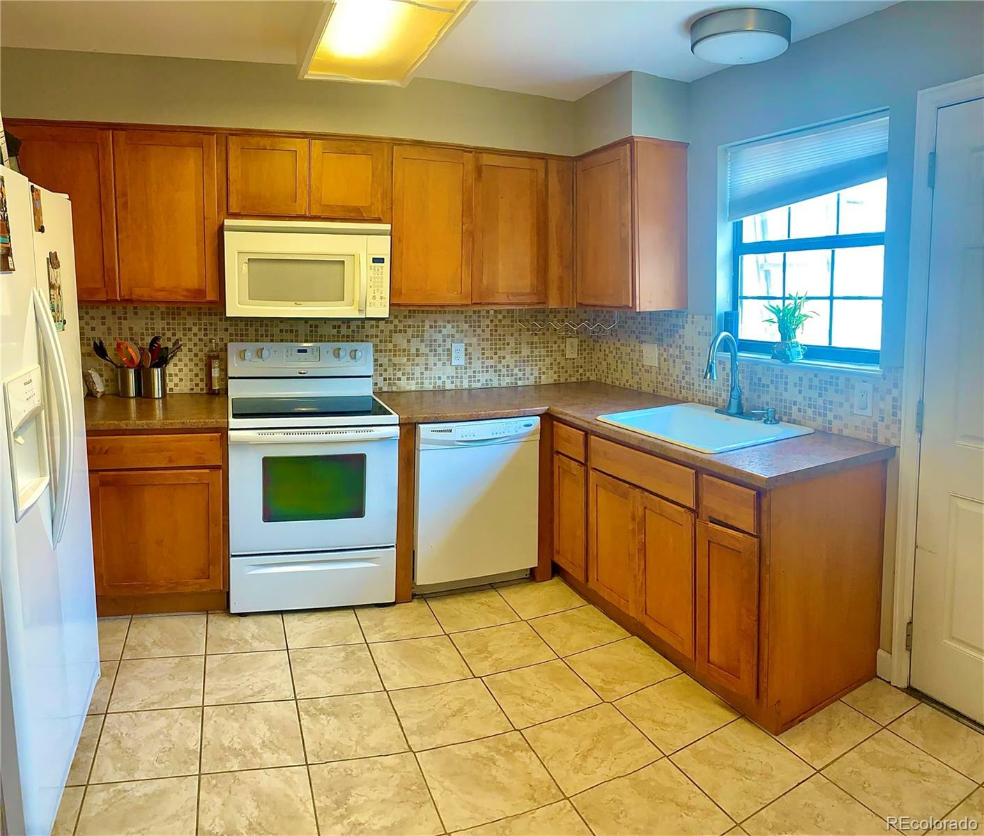 Property Photo: 8164 Washington Street 65 CO 80229