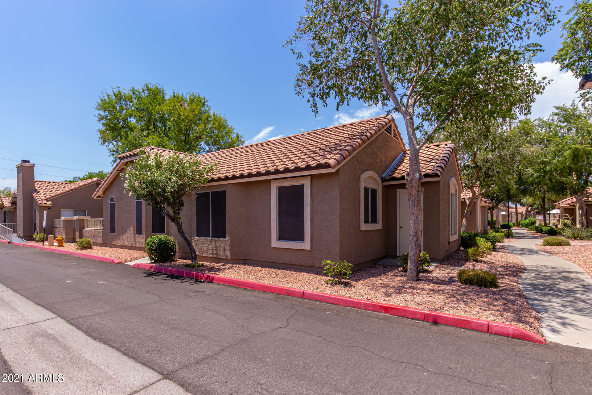 Property Photo:  7040 W Olive Avenue 45  AZ 85345 