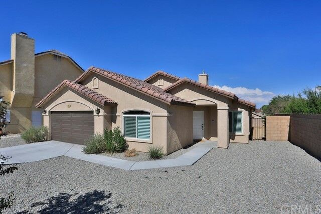 Property Photo: 12745 Autumn Leaves Avenue CA 92395