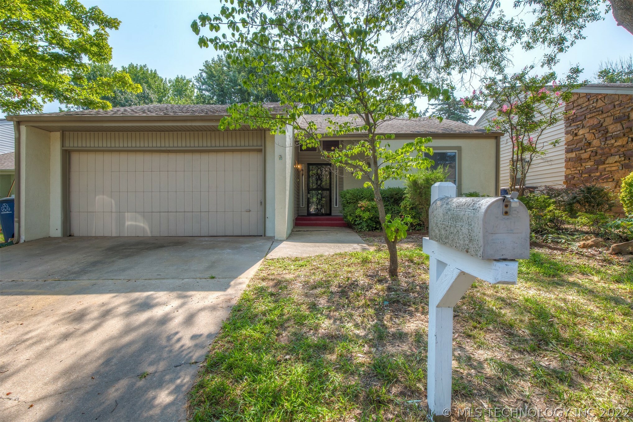 Property Photo:  8167 S Jamestown Avenue  OK 74137 