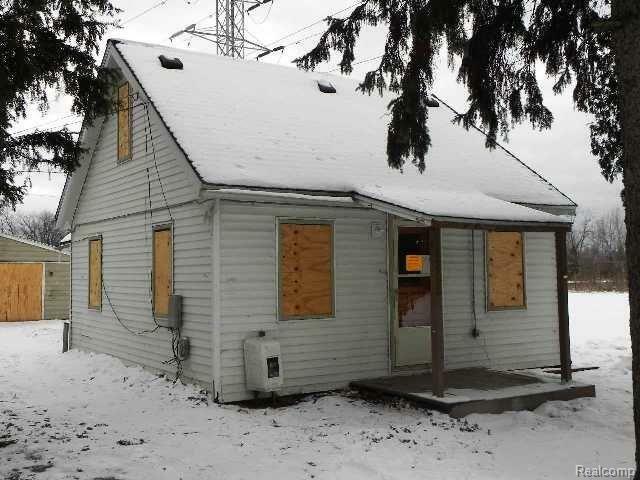 Property Photo:  7395 Farnum Street  MI 48174 