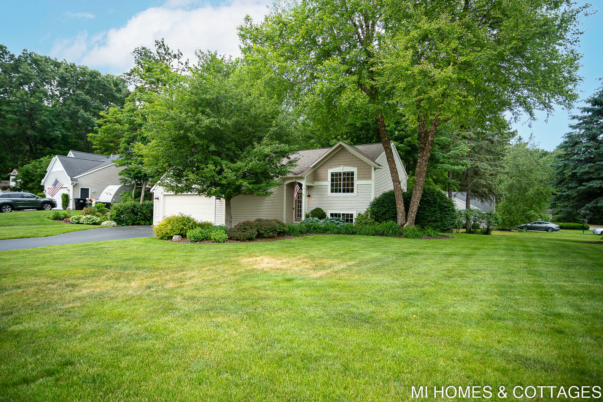 Property Photo:  46 Wind Stream Court  MI 49424 