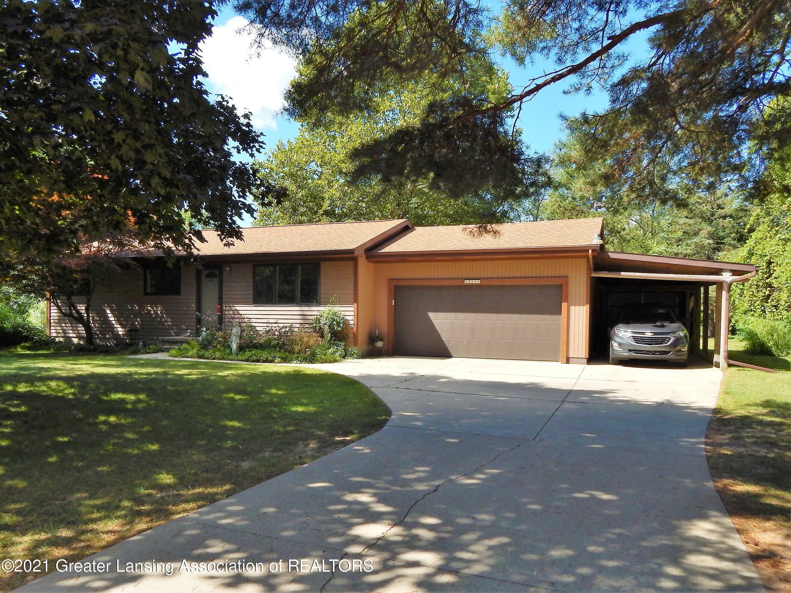 Property Photo:  13330 Wood Road  MI 48808 