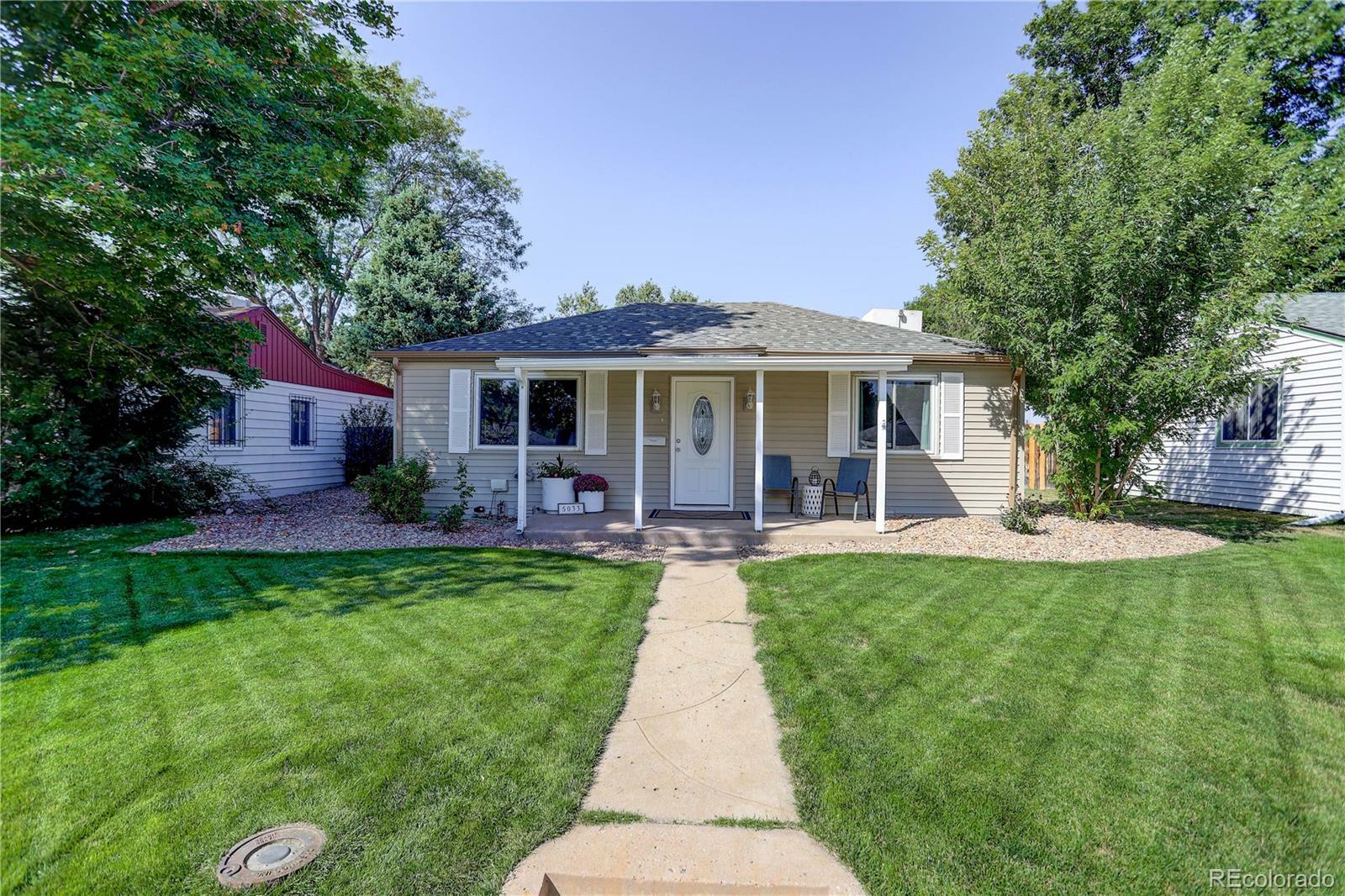 Property Photo:  5033 Wyandot Street  CO 80221 