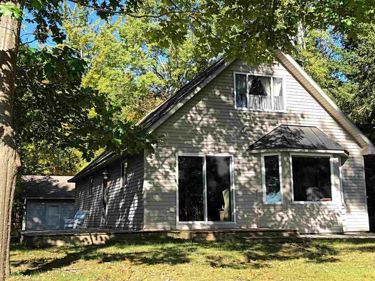 Property Photo:  9180 Silver Strand  MI 49755 