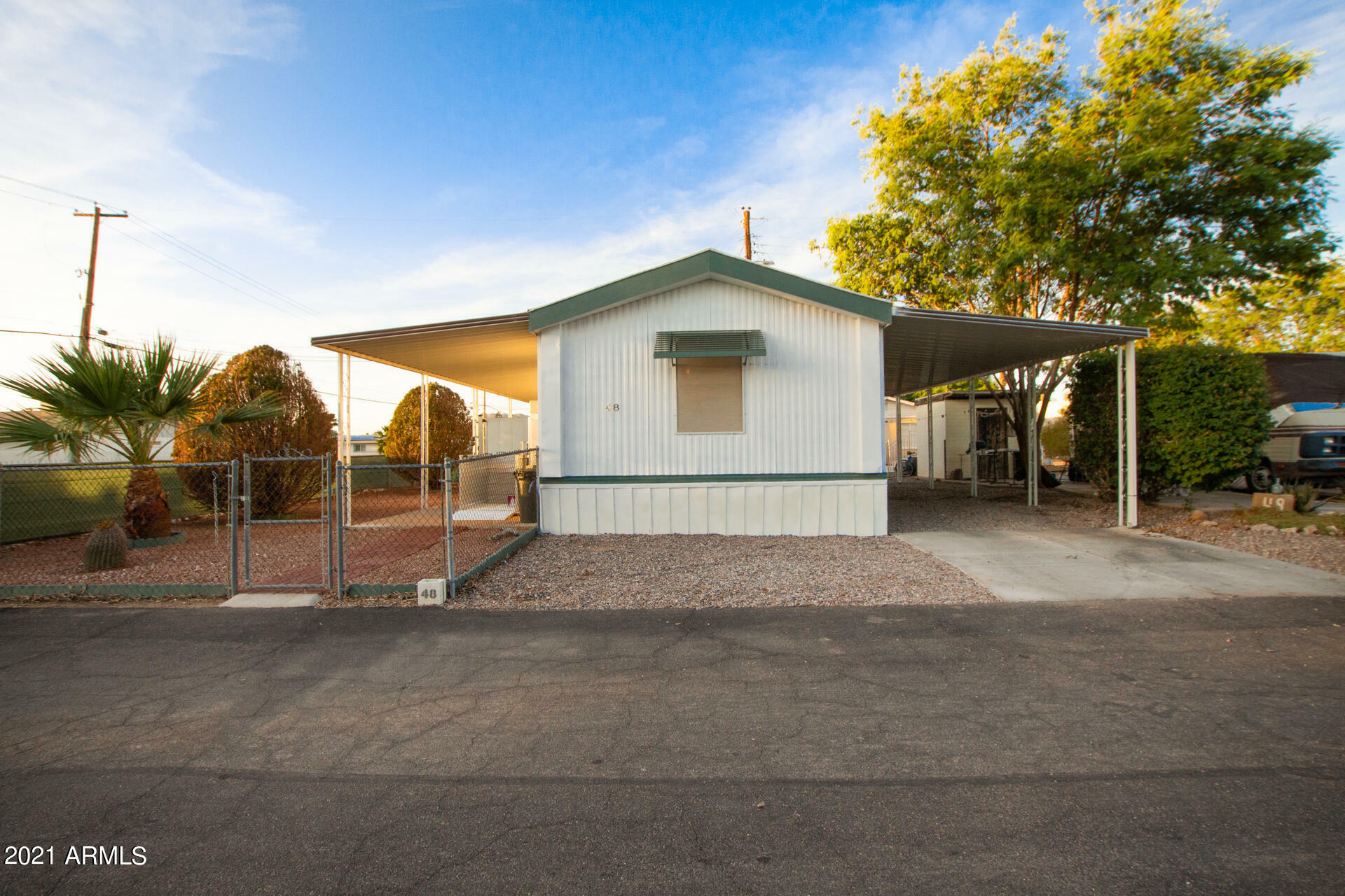 Property Photo:  105 N Delaware Drive 48  AZ 85120 