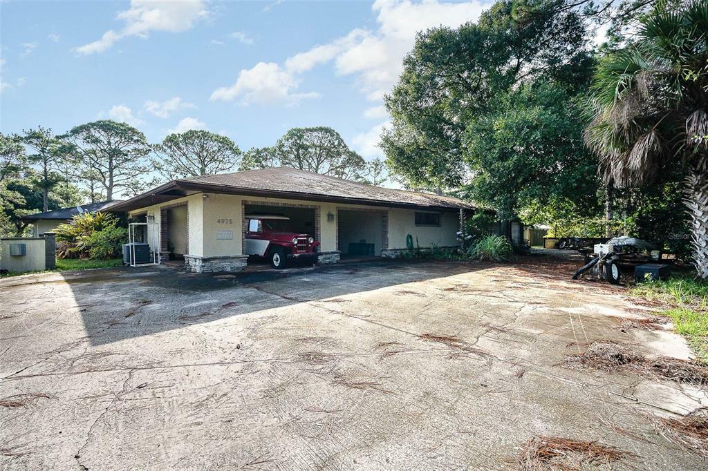 Property Photo:  4975 Pinewood Place  FL 32926 