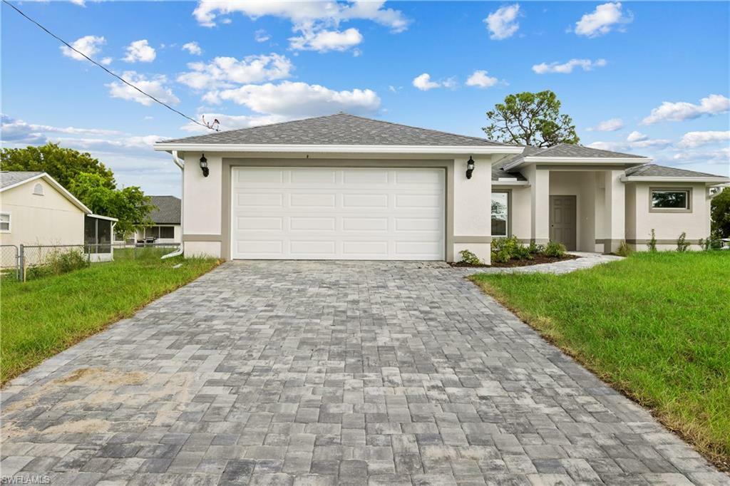 Property Photo: 1911 NW 19th Place FL 33993