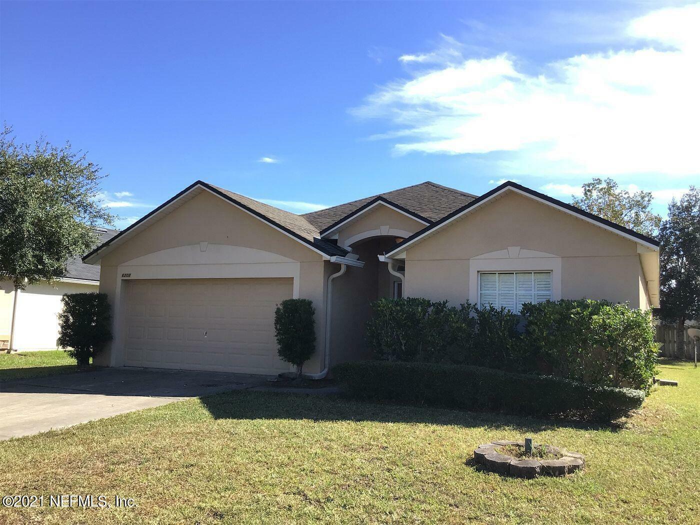 Property Photo:  6208 Rolling Tree Street  FL 32222 