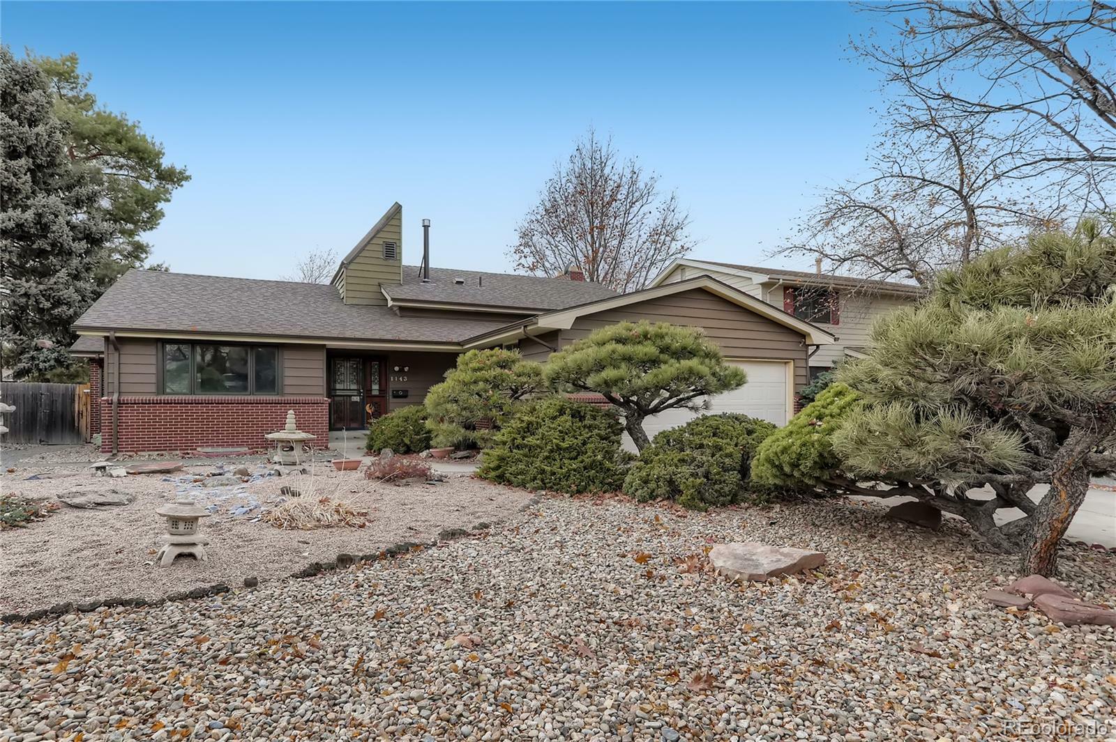 Property Photo: 1143 S Oakland Street CO 80012