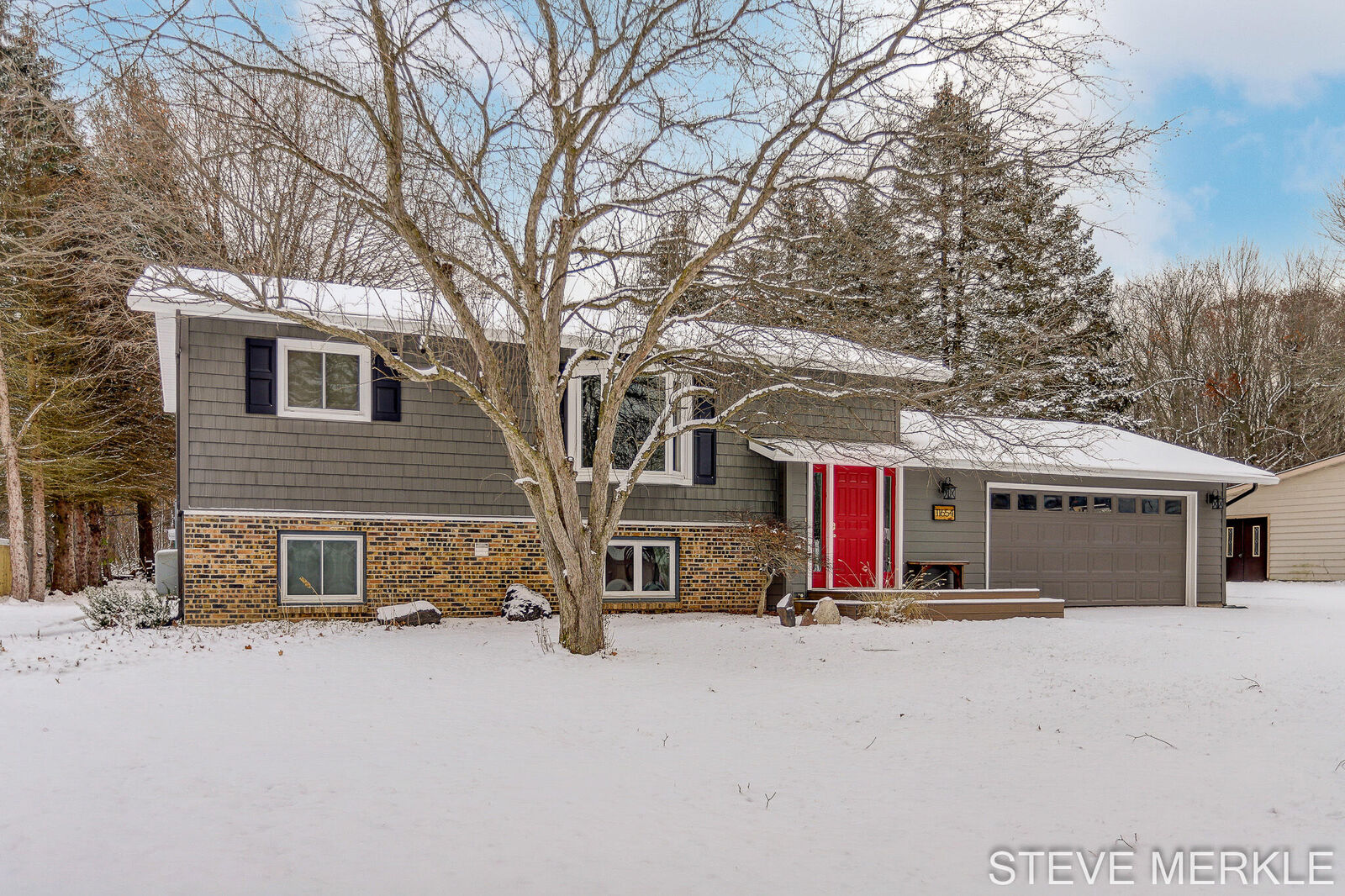 Property Photo:  11654 Woodgate Drive NW  MI 49544 