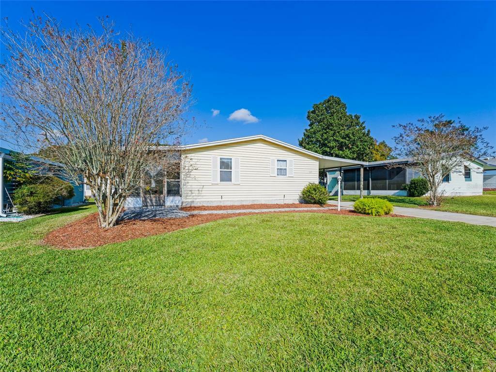 Property Photo:  529 Rainbow Boulevard  FL 32159 