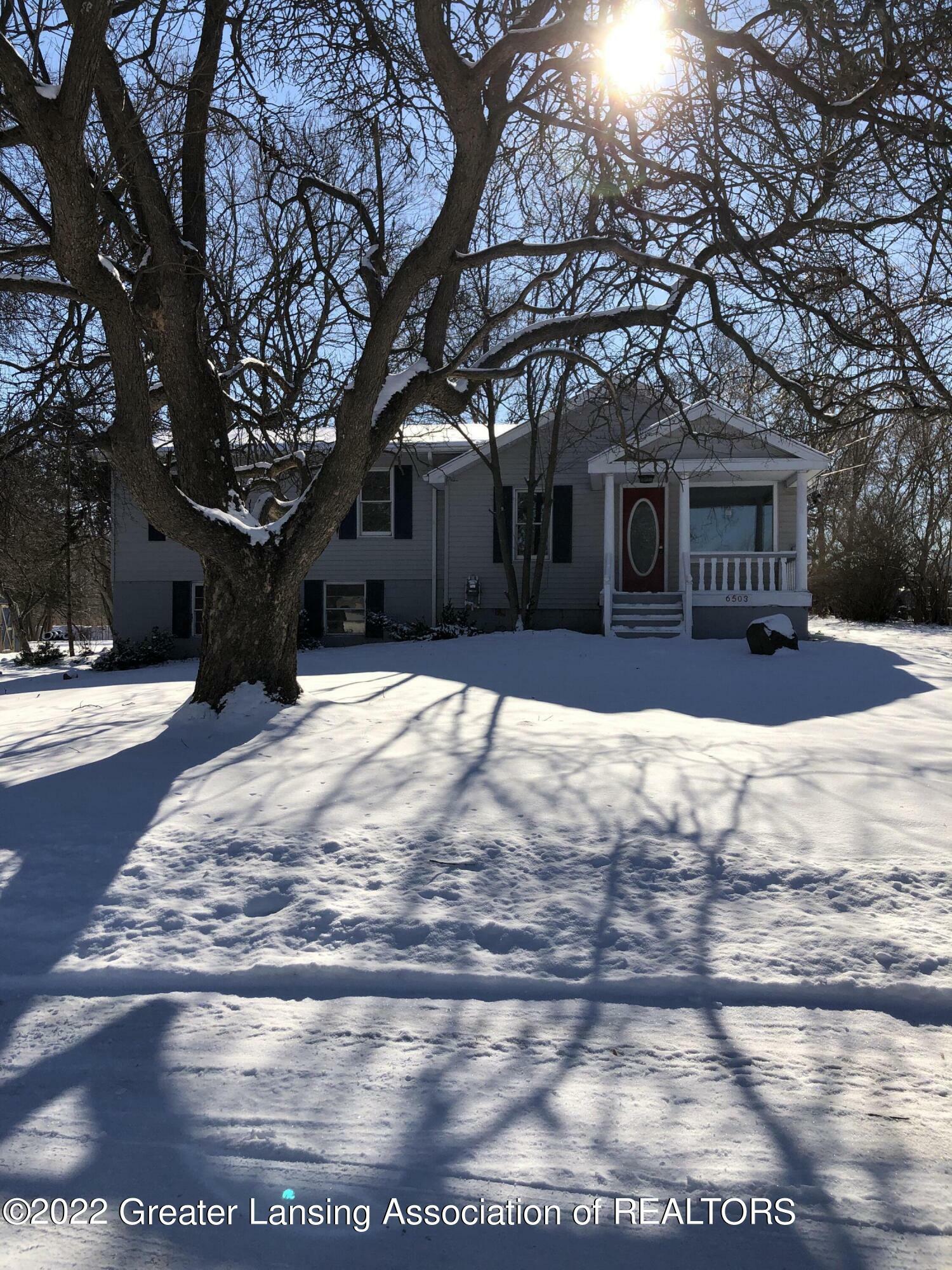 Property Photo:  6503 News Road  MI 48813 