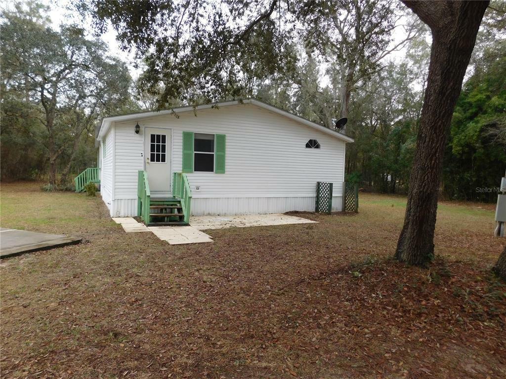 Property Photo:  10890 NE 102nd Place  FL 32618 