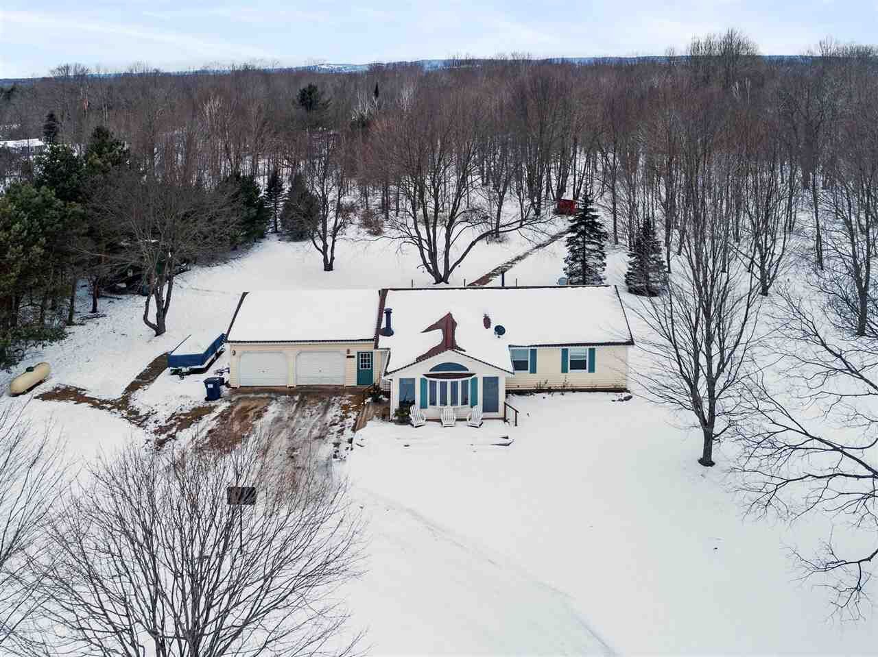 Property Photo:  8597 Pickerel Lake Rd  MI 49770 