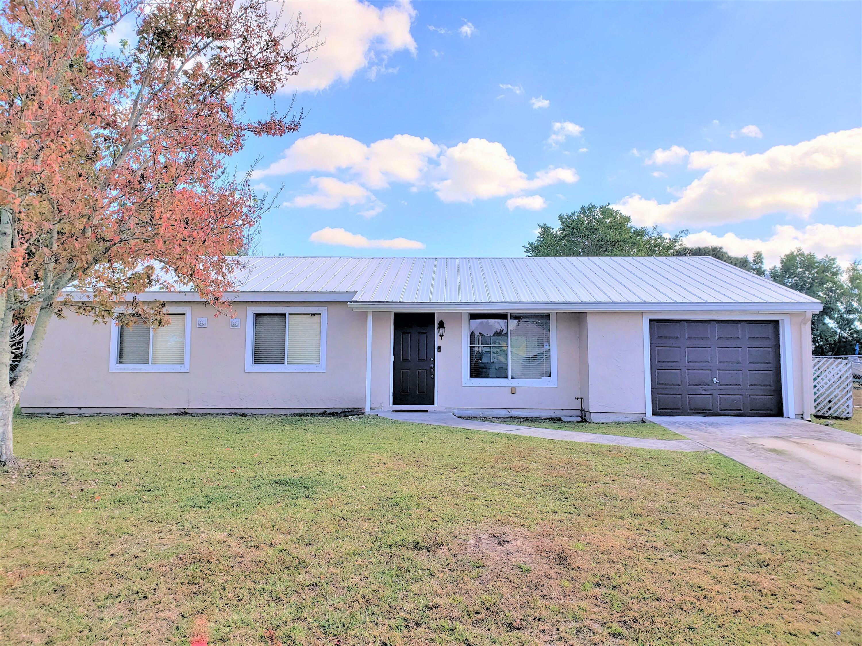 Property Photo:  256 SW Kimball Circle  FL 34953 