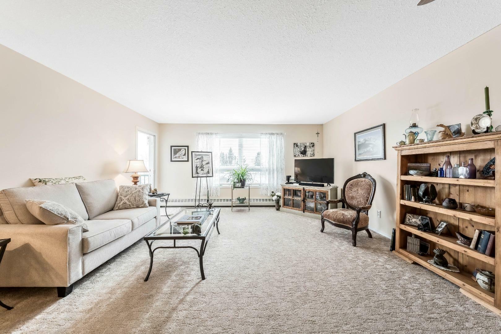 Property Photo: 305, 105 7 Avenue SE 305 AB T1V 1T8