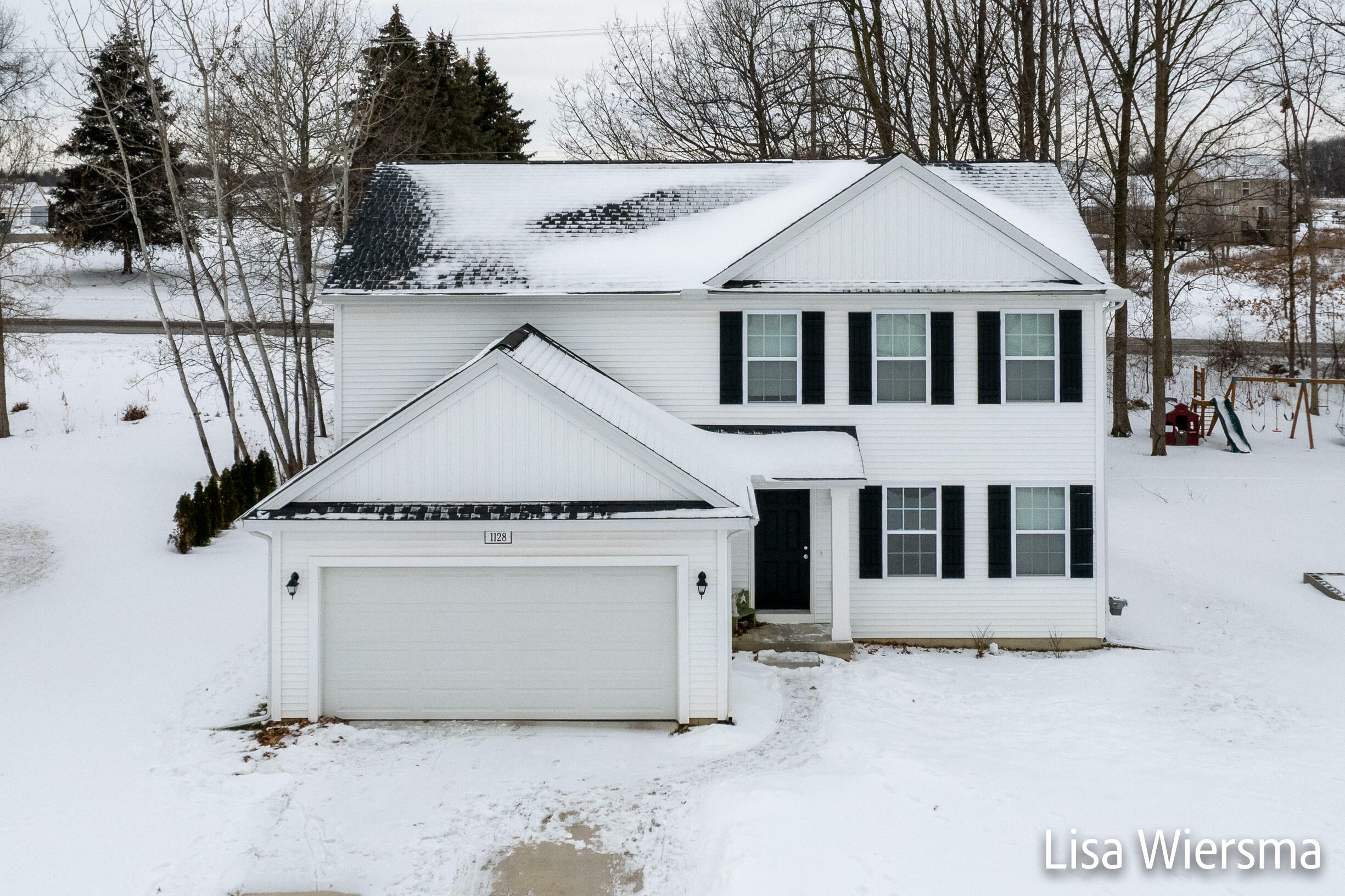 Property Photo:  1128 River Oaks Drive  MI 48820 