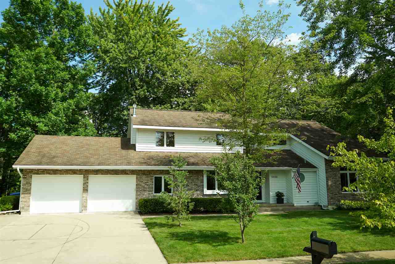 Property Photo:  6020 Emerson Court  MI 48640 