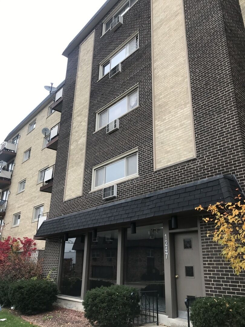 Property Photo: 1247 Harlem Avenue 205 IL 60402