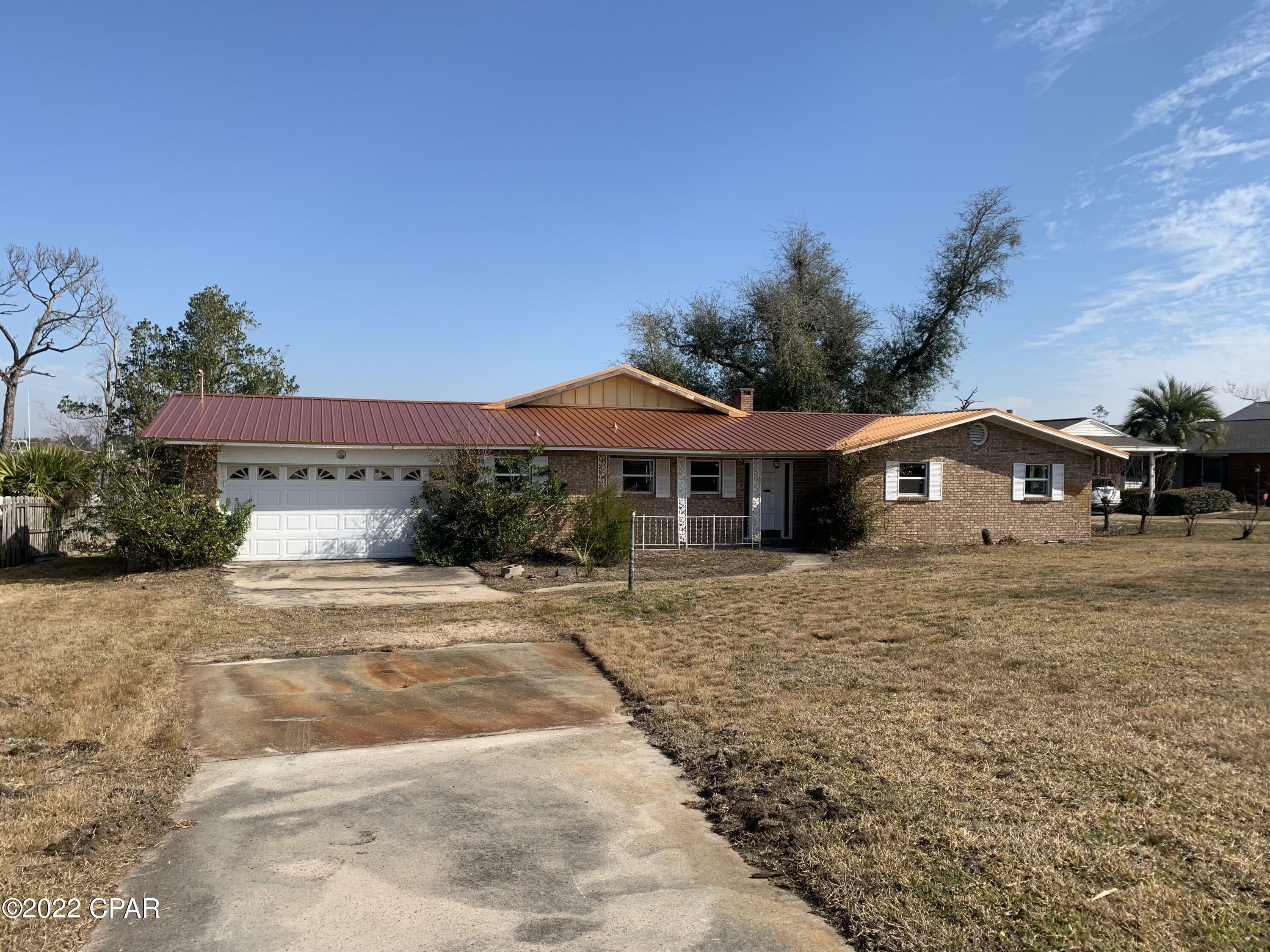 Property Photo:  6905 Hugh Drive  FL 32404 