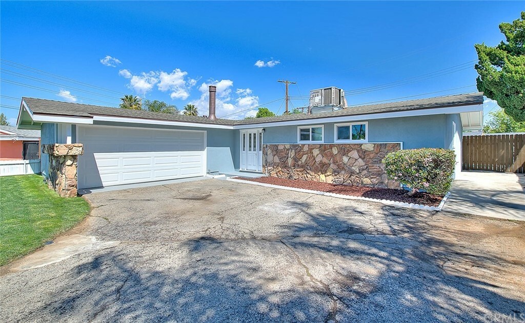 Property Photo:  8868 Amber Street  CA 92503 