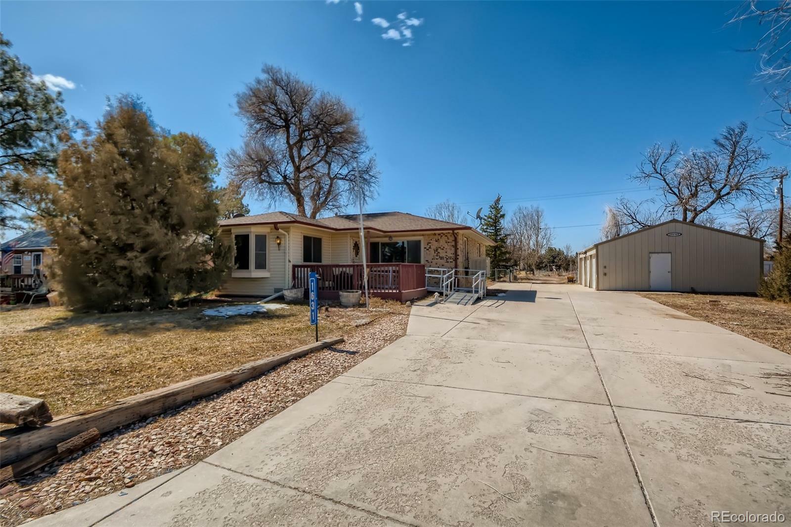 Property Photo:  1631 Arapahoe Street  CO 80136 