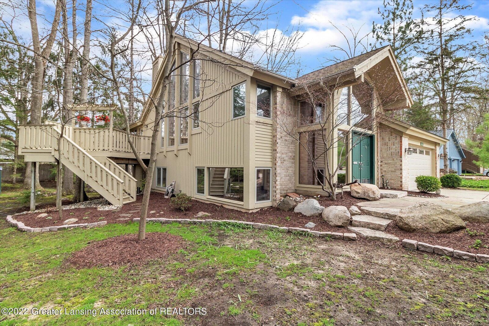 Property Photo:  1236 Woodwind Trail  MI 48840 