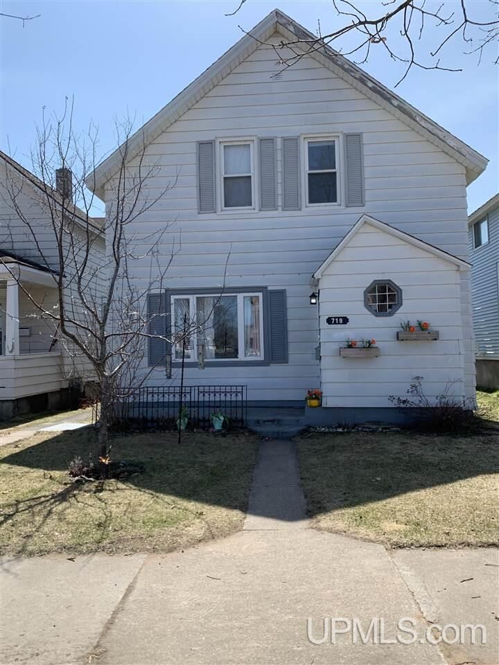 Property Photo:  719 Michigan Avenue  MI 49837 