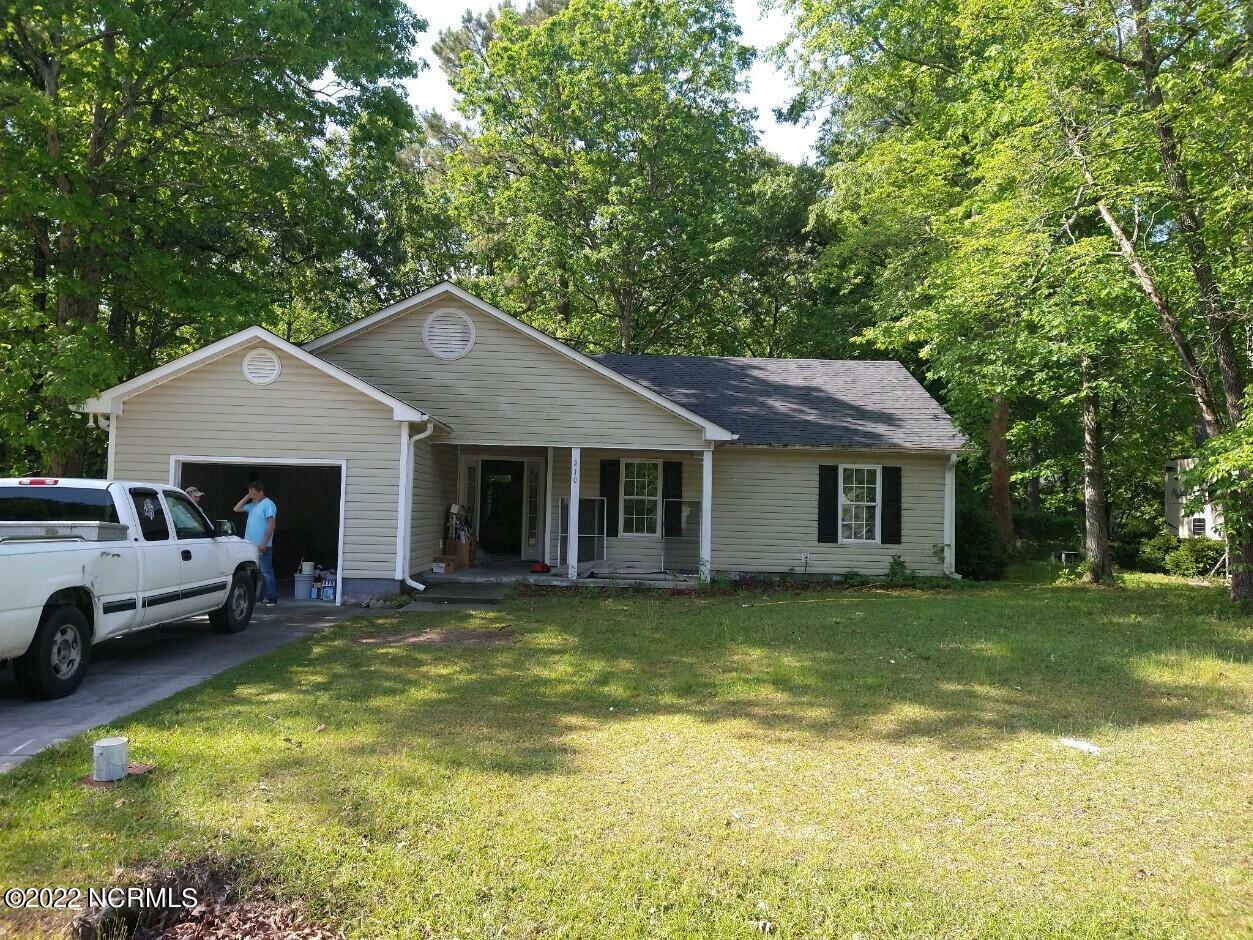 Property Photo:  210 Falling Leaf Court  NC 28540 