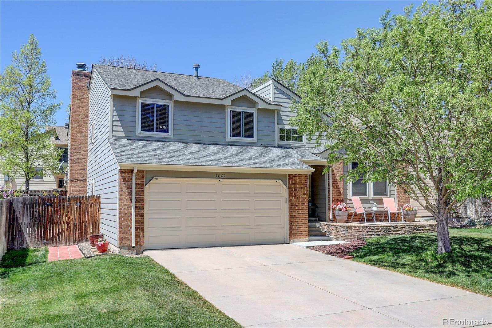 Property Photo:  7041 S Flower Street  CO 80128 