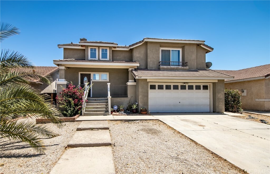 Property Photo:  9387 Nolina Drive  CA 92344 