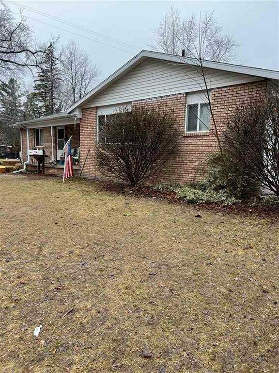 Property Photo:  105/107 Princeton Ct.  MI 48640 