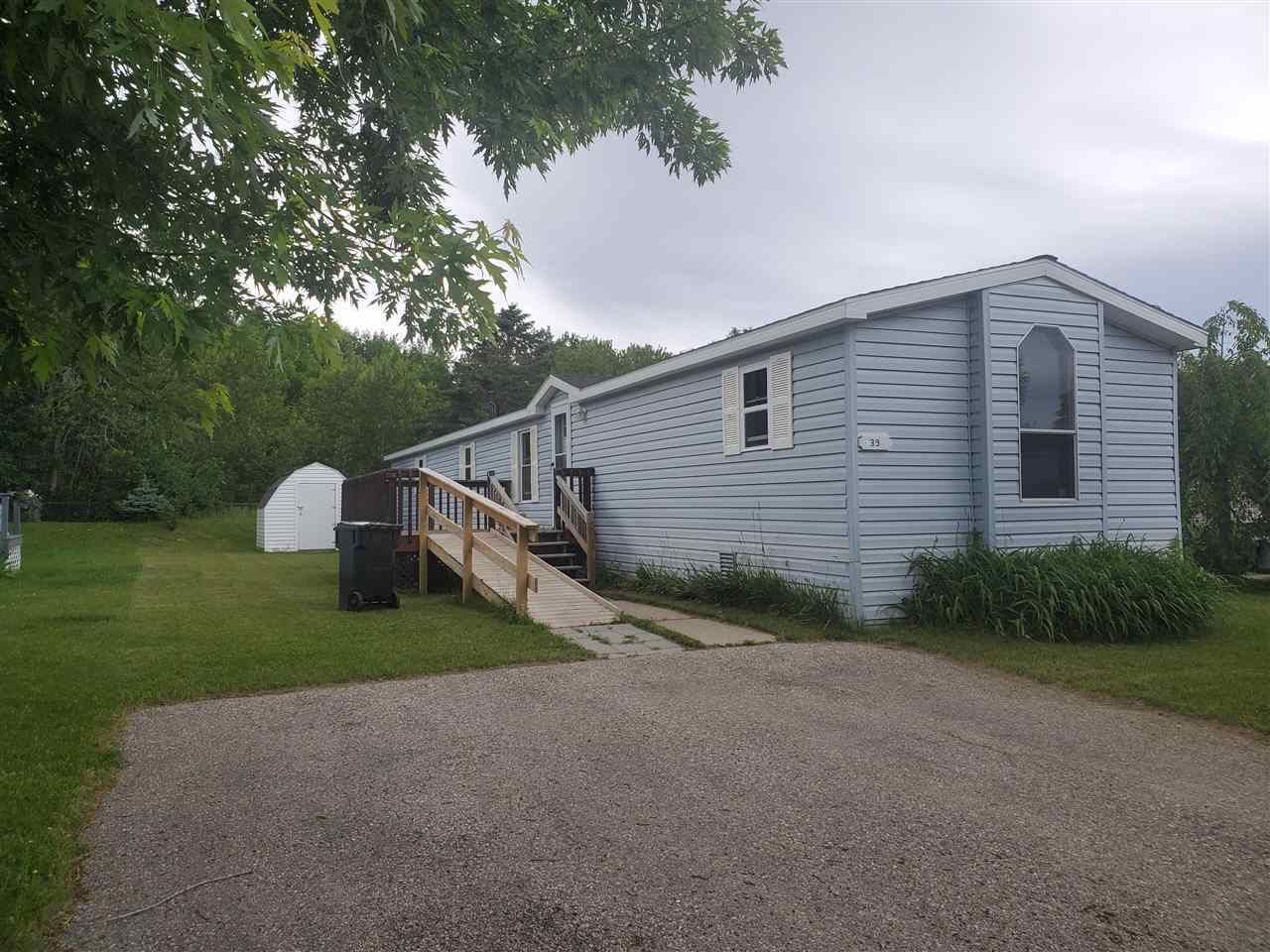 Property Photo: 6685-39 M66 39 MI 49720