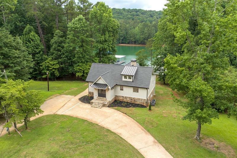 Property Photo:  6055 Robbs Drive  GA 30041 