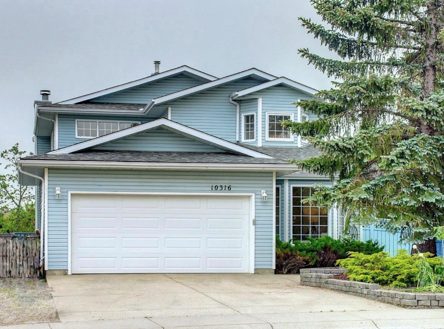 Property Photo: 10316 Hidden Valley Drive NW AB T3A 4Z6