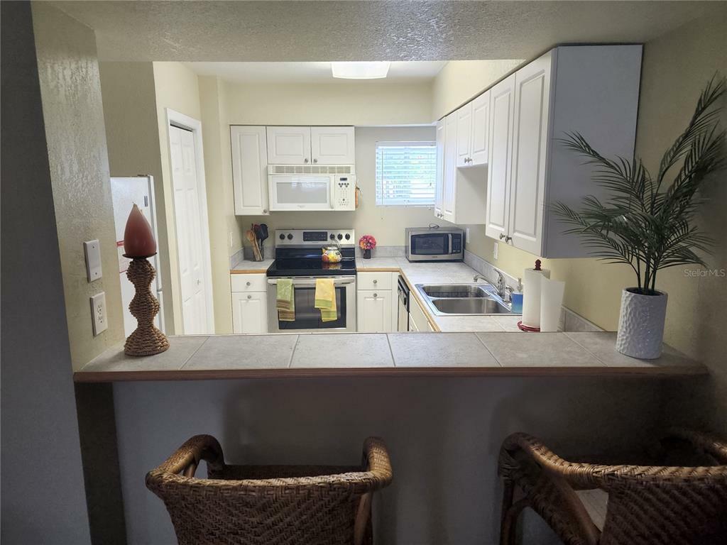 Property Photo: 22375 Edgewater Drive 122-F FL 33980