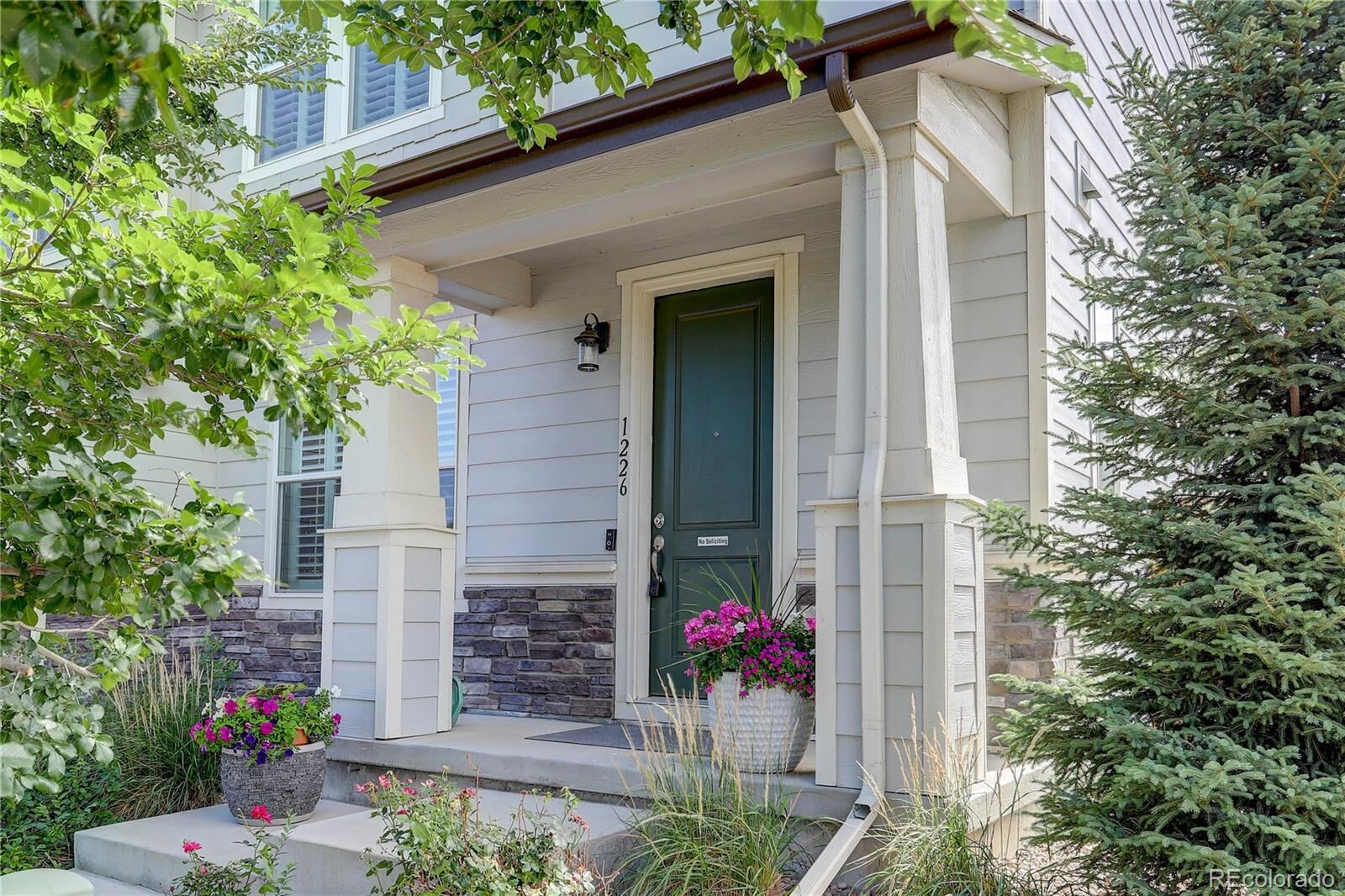Property Photo: 1226 S Clinton Street CO 80247