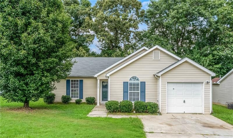 Property Photo:  5799 Eagles Feather Lane  GA 30274 