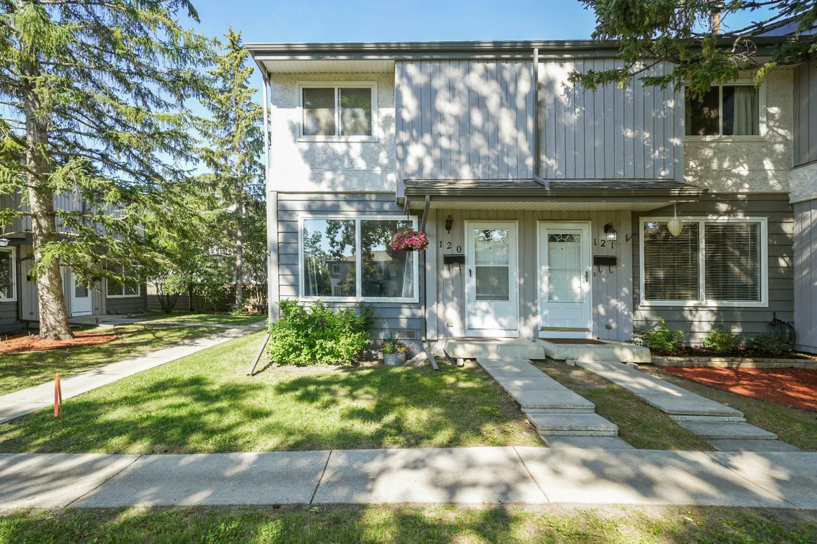 Property Photo: 120, 999 Canyon Meadows Drive SW 120 AB T2W 2S6
