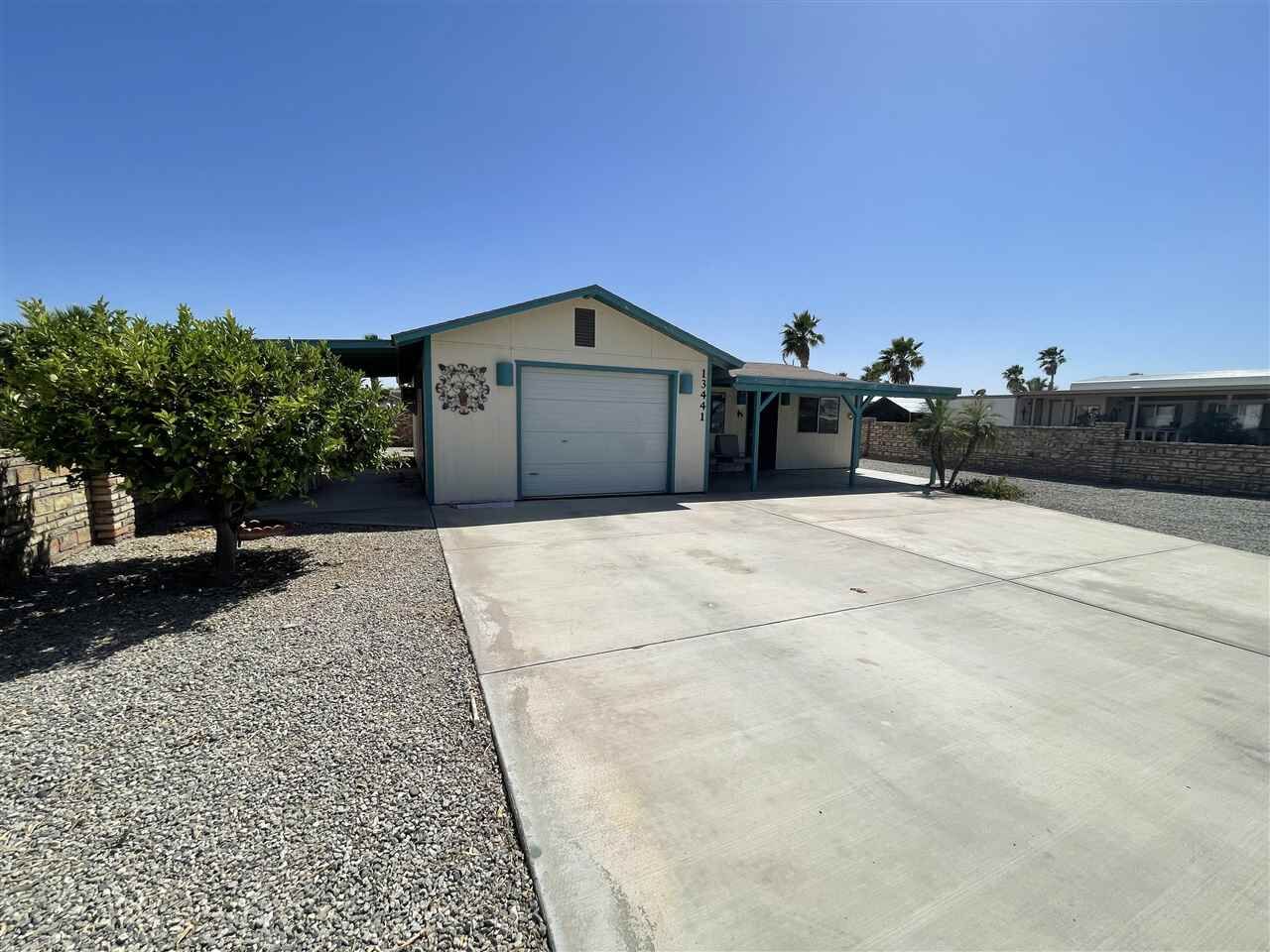 Property Photo:  13441 E 51 Ln  AZ 85367 