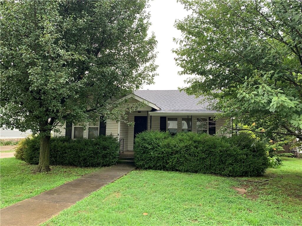Property Photo:  407 NW C Street  AR 72712 