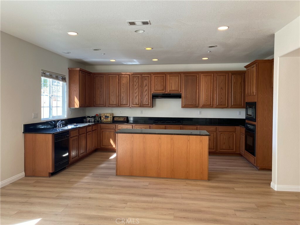 Property Photo:  15597 Brewer Lane  CA 92336 