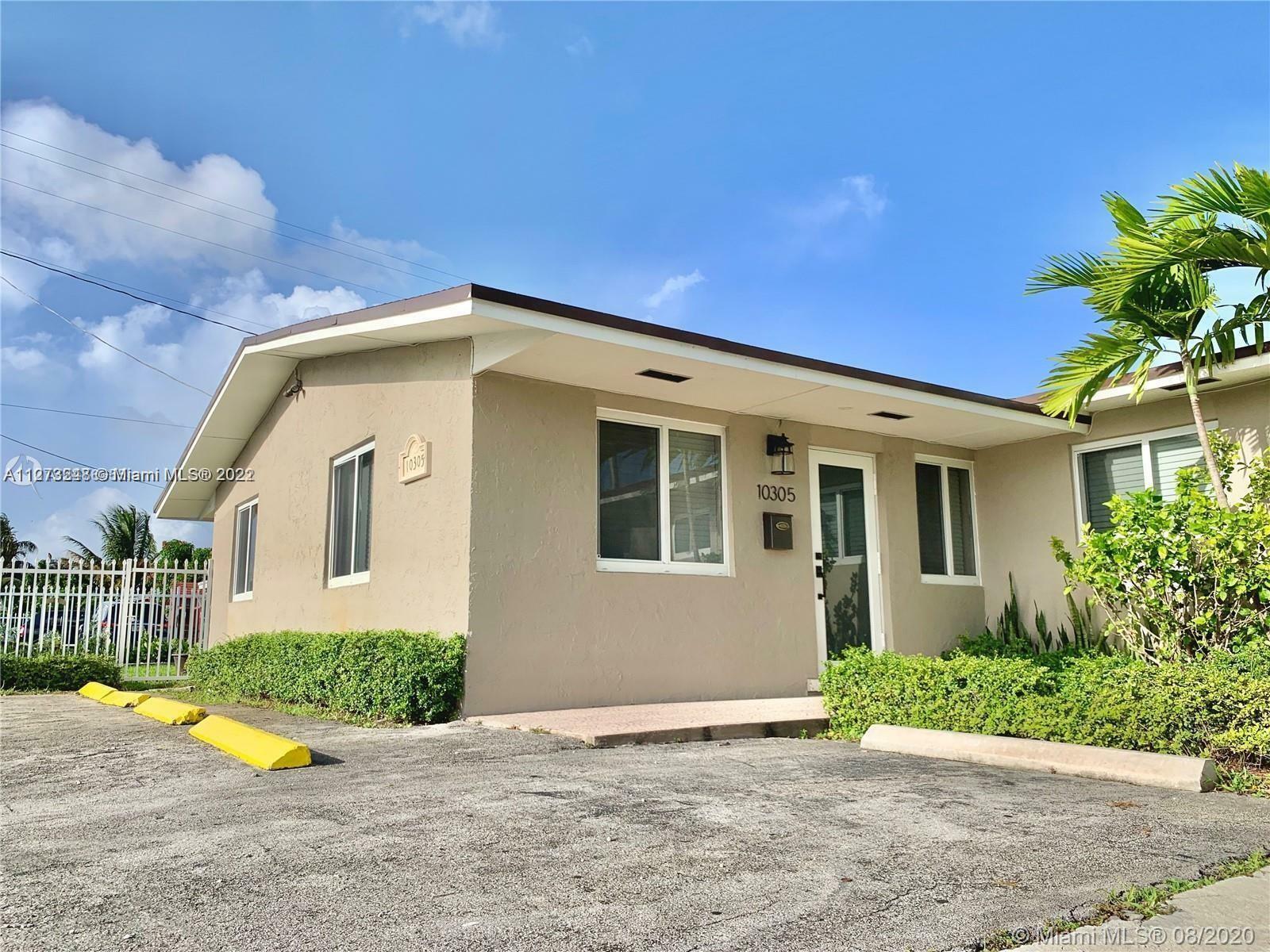 Property Photo: 10303 NW 35th Pl 10305 FL 33147